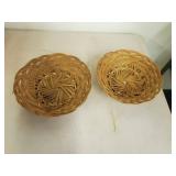 Faux flowers and 2 wicker baskets