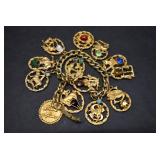 Estee Lauder Rhinestone Gold Tone Charm Bracelet