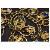 Estee Lauder Rhinestone Gold Tone Charm Bracelet
