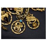 Estee Lauder Rhinestone Gold Tone Charm Bracelet