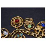 Estee Lauder Rhinestone Gold Tone Charm Bracelet