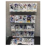 Approximately 40 Gameday NFL Oversized Football Cards