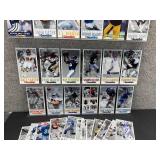 Approximately 40 Gameday NFL Oversized Football Cards