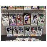 Approximately 40 Gameday NFL Oversized Football Cards