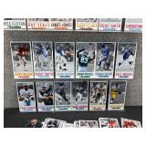 Approximately 40 Gameday NFL Oversized Football Cards