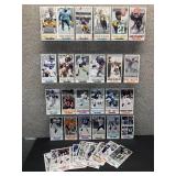 Approximately 40 Gameday NFL Oversized Football Cards