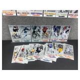 Approximately 40 Gameday NFL Oversized Football Cards