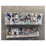 Approximately 40 Gameday NFL Oversized Football Cards