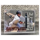 1997 Donruss Limited Baseball Card Fabric of the Game #32 Ser. No. 065/500 Andres Galarraga