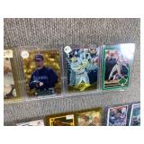 Lot of 50 Baseball and Football Cards in Hard Cases