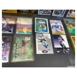 Lot of 50 Baseball and Football Cards in Hard Cases