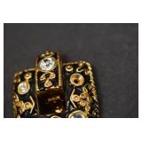 Gold Toned Black Enamel Clip on Earrings