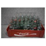 Lot of 29 Various Coca-Cola Bottles in Plastic Carrier