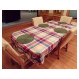 TABLE W/4 LEATHER CHAIRS ON WHEELS