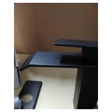 Genta Single Hole Single-Handle Bathroom Faucet in Matte Black may vary from stock photo