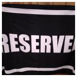 BEACH TOWEL BLACK WITH RESERVED ON IT