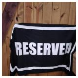 BEACH TOWEL BLACK WITH RESERVED ON IT