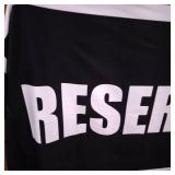 BEACH TOWEL BLACK WITH RESERVED ON IT