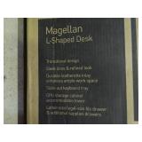 realspace Magellan L-shaped desk, gray in color. New in box. Measurements in pictures.