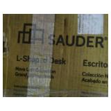 Sauder L-shaped desk. New in box. Measurements in pictures.
