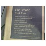realspace pneumatic sit or stand desk riser. With black finish.  Measurements in pictures. New in box.