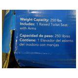 Toilet seat elevator with handles.