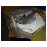 Toilet seat elevator with handles.