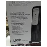 Electric oil filled 1500 watt radiator heater, new in box.
