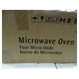 Brand new large Frigidaire Gallery microwave oven.