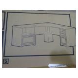 Magellan Performance Collection L-shaped desk with Cherry finish. New in original boxes.