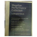 Magellan Performance Collection L-shaped desk with Expresso finish. New in original boxes.  Measurements in pictures.