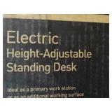 realspace electric height adjustable standing desk.  New in box.