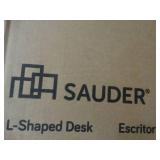 Sauder L-shaped desk, new in box.