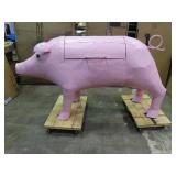 Very large pig shaped grill / smoker.