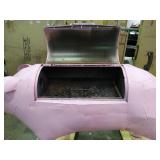 Very large pig shaped grill / smoker.