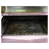 Very large pig shaped grill / smoker.