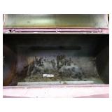 Very large pig shaped grill / smoker.