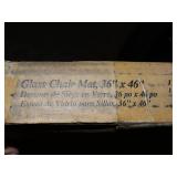 Glass chair mat, 36" x 46", new in box. Retails for $179.
