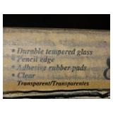 Glass chair mat, 36" x 46", new in box. Retails for $179.