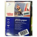5 boxes of different brands of photo paper.