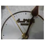 Small World Rhythm wall clock. Has 3 different selections of melodies.
