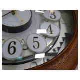 Small World Rhythm wall clock. Has 3 different selections of melodies.