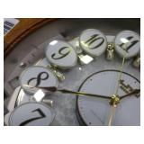 Small World Rhythm wall clock. Has 3 different selections of melodies.