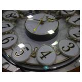 Small World Rhythm wall clock. Has 3 different selections of melodies.