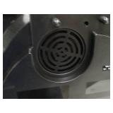 Small World Rhythm wall clock. Has 3 different selections of melodies.