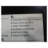 Small World Rhythm wall clock. Has 3 different selections of melodies.