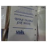 Multiple packages of new loose leaf memo book paper