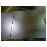 Small desk with built in outlets.