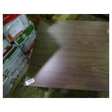 Small desk with built in outlets.