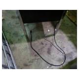 Small desk with built in outlets.